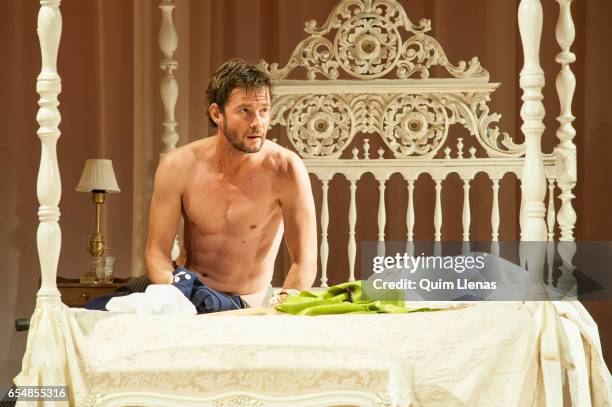 Spanish actor Eloy Azorin performs during the dress rehearsal of the play 'Una gata sobre un tejado de zinc caliente' by Tennessee Williams on stage...
