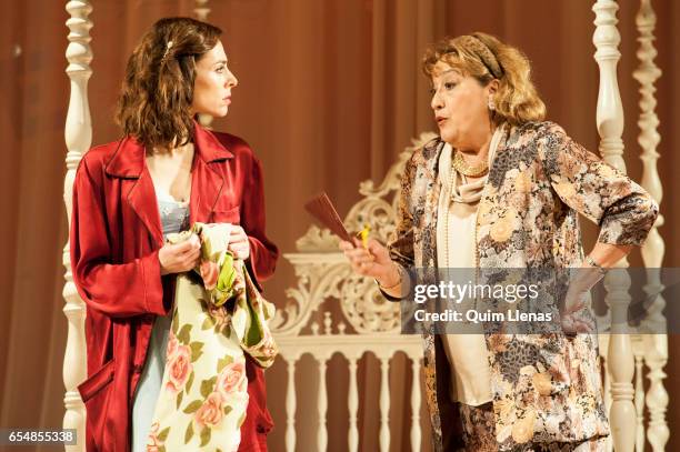 Spanish actresses Begona Maestre and Ana Marzoa perform during the dress rehearsal of the play 'Una gata sobre un tejado de zinc caliente' by...