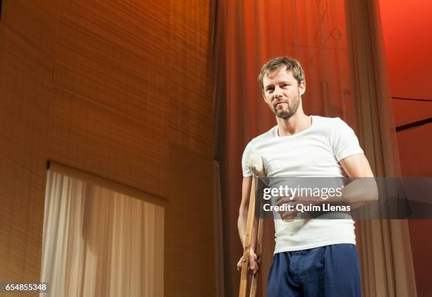 Spanish actor Eloy Azorin performs during the dress rehearsal of the play 'Una gata sobre un tejado de zinc caliente' by Tennessee Williams on stage...