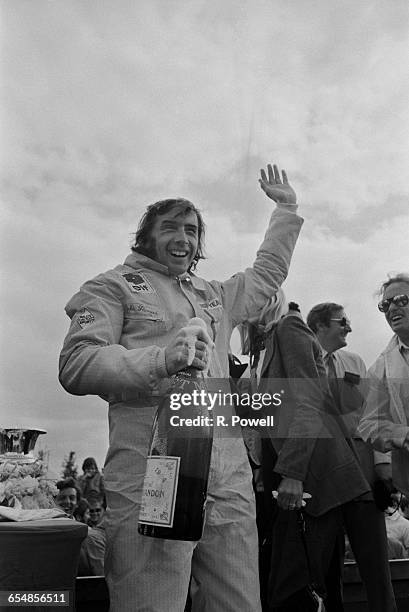 Scottish racing driver Jackie Stewart wins the British Grand Prix at Silverstone, UK, 17th July 1971.