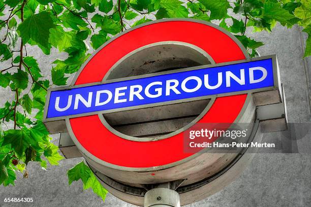 london underground sign, euston square - london-underground-station-sign stock pictures, royalty-free photos & images