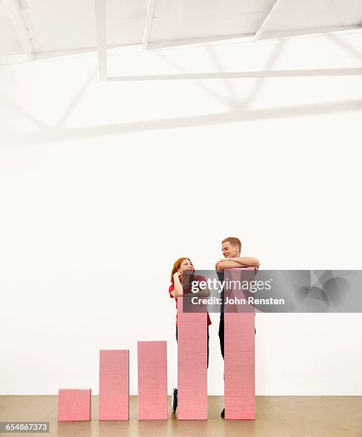 people doing puzzles with oversized props - size chart stock pictures, royalty-free photos & images