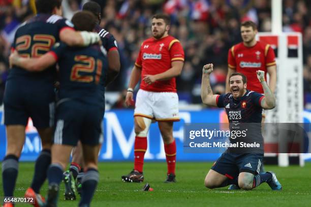 Camille Lopez of France sinks to his knees after converting a try to claim a 20-18 victory during the RBS Six Nations match between France and Wales...