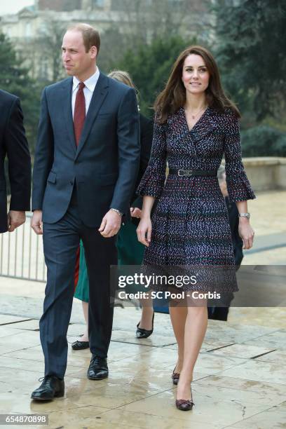 Britain's Catherine, Duchess of Cambridge and Prince William, Duke of Cambridge visit a 'Les Voisins in Action' event highlighting the strong ties...