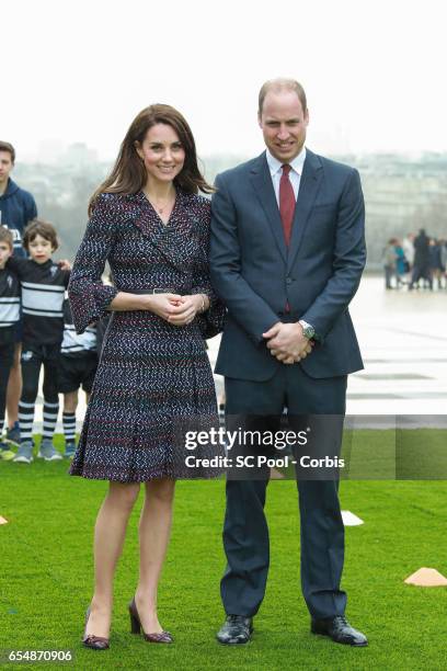 Britain's Catherine, Duchess of Cambridge and Prince William, Duke of Cambridge visit a 'Les Voisins in Action' event highlighting the strong ties...