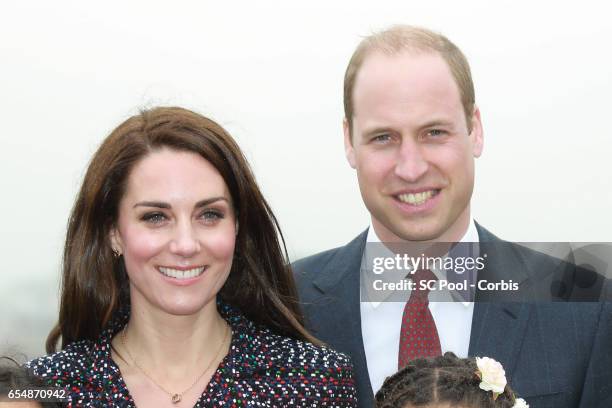 Britain's Catherine, Duchess of Cambridge and Prince William, Duke of Cambridge visit a 'Les Voisins in Action' event highlighting the strong ties...