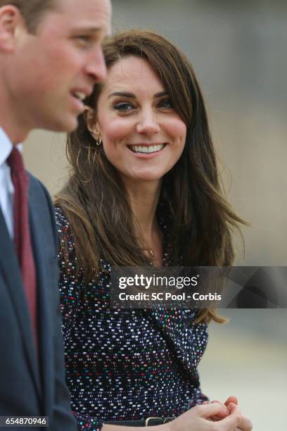 Britain's Catherine, Duchess of Cambridge and Prince William, Duke of Cambridge visit a 'Les Voisins in Action' event highlighting the strong ties...