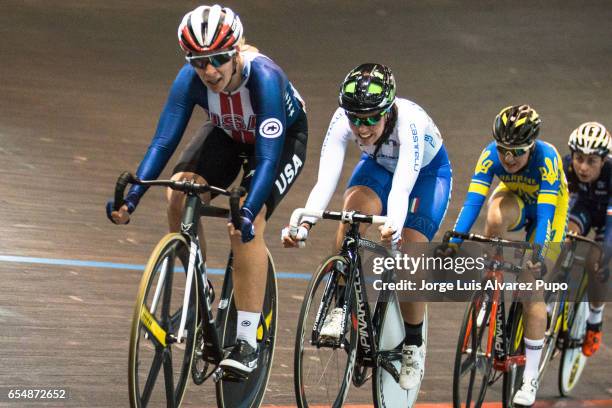 Sarah Hammer of US and Elisa Balsno of Italy compete in the Women's Scratch race of the Omnium on day two of the Belgian International Track Meeting...