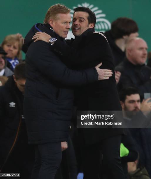 Ronald Koeman manager of Everton and Marco Silva manager of Hull City embrace after the Premier League match between Everton and Hull City at...