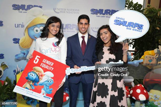 Young Sustainable Development Goals Advocates Sarina Divan, Karan Jerath, and Noor Samee pose at the United Nations Headquarters celebrating...