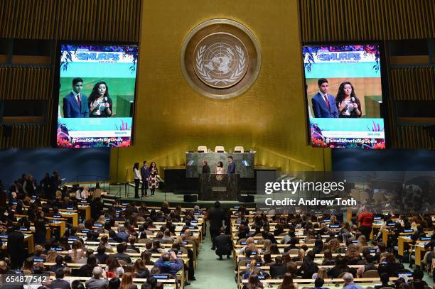 Young Sustainable Development Goals Advocates Sarina Divan, Karan Jerath, and Noor Samee onstage with actors Mandy Patinkin, Demi Lovato, and Joe...