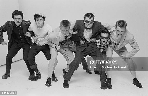 English pop/ska band Madness, during the cover shoot for their album '7', London, 1981. Left to right: Chris Foreman, Lee Thompson, Chas Smash,...