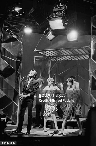 The Human League performing to their single 'Love Action ' on the BBC TV music show, 'Top Of The Pops', London, 6th August 1981. Left to right: Phil...