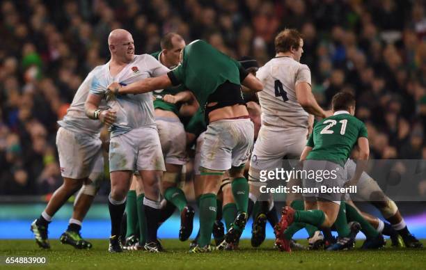 Dan Cole of England tussles with CJ Stander of Ireland during the RBS Six Nations match between Ireland and England at the Aviva Stadium on March 18,...