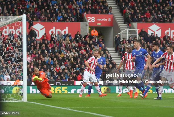 Stoke City's Lee Grant sees Chelsea's Willian get past him for the first Chelsea goal during the Premier League match between Stoke City and Chelsea...