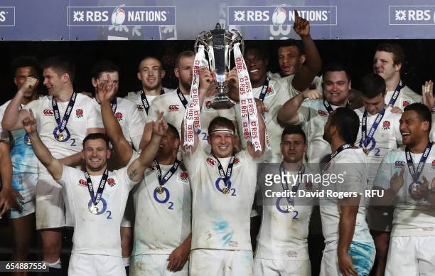 Captain Dylan Hartley of England lifts the Six nations trophy following the RBS Six Nations match between Ireland and England at the Aviva Stadium on...