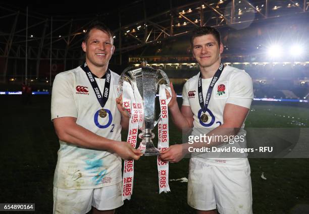 Captain Dylan Hartley and Owen Farrell of England pose with the Six Nations trophy during the RBS Six Nations match between Ireland and England at...