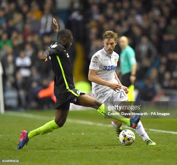 Leeds United's Charlie Taylor battles with Brighton and Hove Albion's Fikayo Tomori during the Sky Bet Championship match at Elland Road, Leeds.