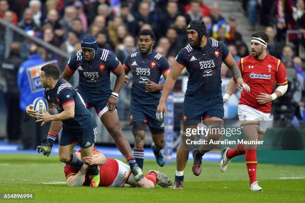 Brice Dulin of France is tackled during the RBS Six Nations match between France and Wales at Stade de France on March 18, 2017 in Paris, France.