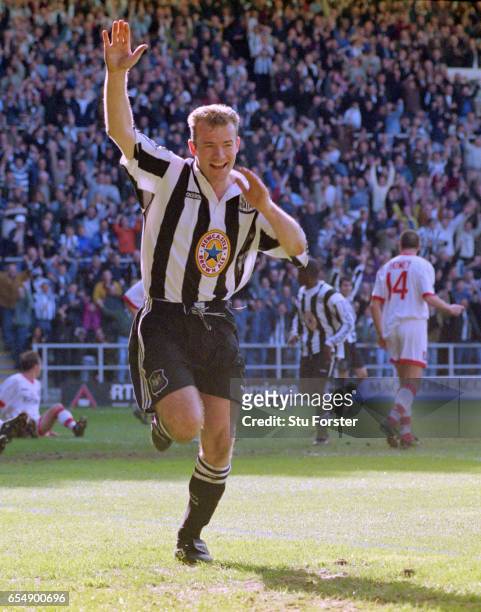 Newcastle striker Alan Shearer celebrates after scoring in the 77th minute during the FA Premier League match at St James' Park on April 5, 1997 in...