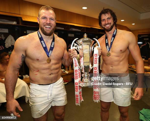 James Haskell and Tom Wood celebrate with the Six Nations trophy during the RBS Six Nations match between Ireland and England at the Aviva Stadium on...