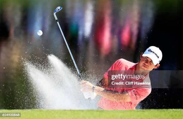 Brian Harman of the United States plays a shot from a bunker on the 17th hole during the third round of the Arnold Palmer Invitational Presented By...