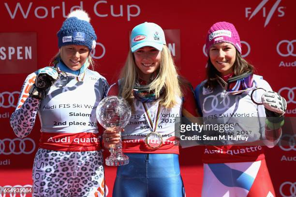 Veronika Velez Zuzulova of Slovakia in second place, Mikaela Shiffrin of the United States in first place, and Wendy Holdener of Switzerland in third...