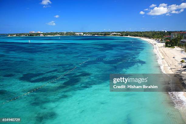 summer beach time! - cable beach bahamas stock pictures, royalty-free photos & images