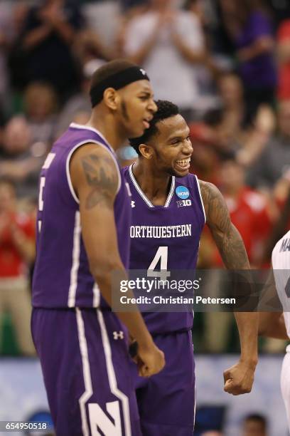 Dererk Pardon and Vic Law of the Northwestern Wildcats celebrate a run of points against the Gonzaga Bulldogs during the second round of the 2017...