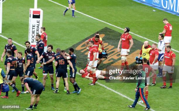 Damien Chouly of France scores the try of the victory at 100 minutes and celebrate the victory with teammates during the RBS Six Nations match...