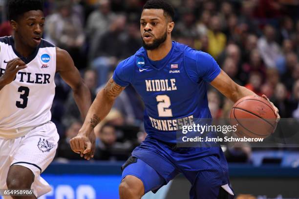 Middle Tennessee Blue Raiders guard Antwain Johnson dribbles past Butler Bulldogs guard Kamar Baldwin during the first half of the 2017 NCAA Photos...