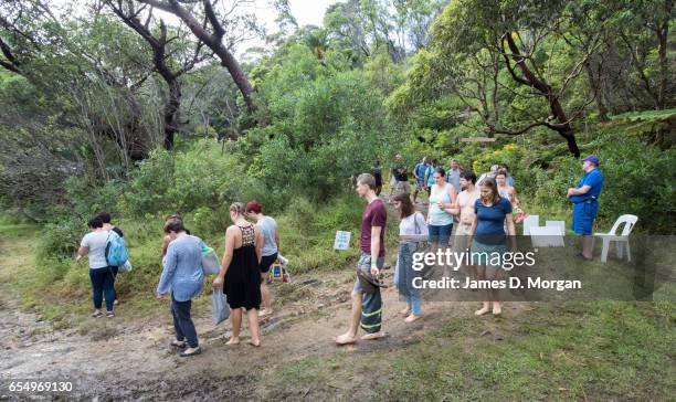 Swimmers walk donw to the beach before the "Sydney Skinny" on March 19, 2017 in Sydney, Australia. The annual nude swim event encourages swimmers to...