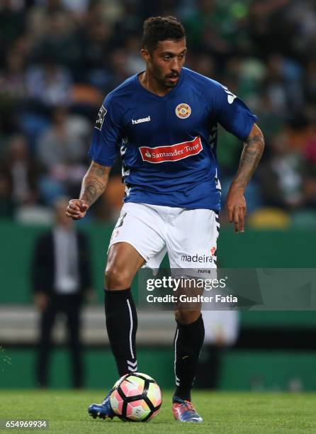 Nacional's defender Cesar from Brazil in action during the Primeira Liga match between Sporting CP and CD Nacional at Estadio Jose Alvalade on March...