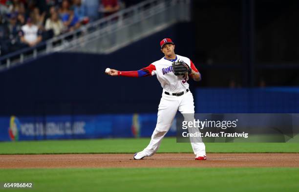 Manny Machado of Team Dominican Republic throws to first in the top of the first inning of Game 6 of Pool F of the 2017 World Baseball Classic...