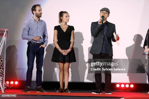 Amelie Etasse, Kim Seong-hun and Antoine Gouy attend closing ceremony of Valenciennes Cinema Festival on March 18, 2017 in Valenciennes, France.