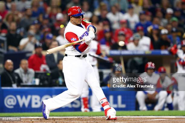 Manny Machado of Team Dominican Republic bats in the first inning of Game 6 of Pool F of the 2017 World Baseball Classic against Team USA on...