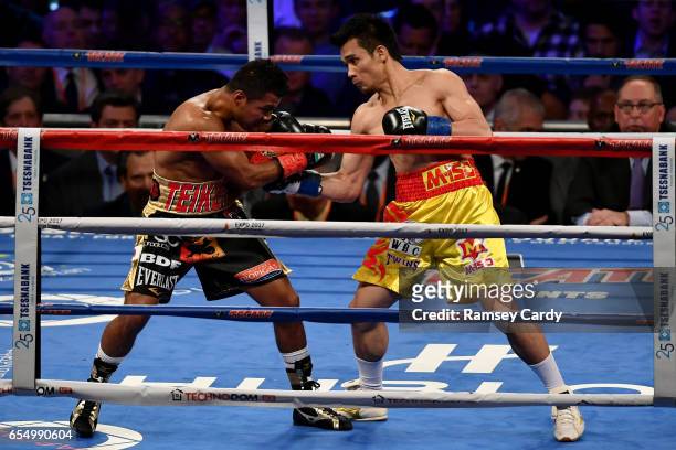 New York , United States - 18 March 2017; Roman Gonzalez, left, in action against Srisaket Sor Rungvisai during their super flyweight title bout at...