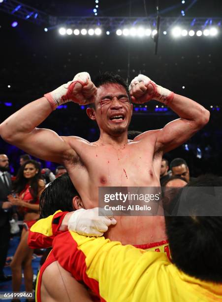 Srisaket Sor Rungvisai celebrates a majority decision win defeating Roman "Chocolatito" Gonzalez or Gonzalez's WBC junior bantamweight title at...