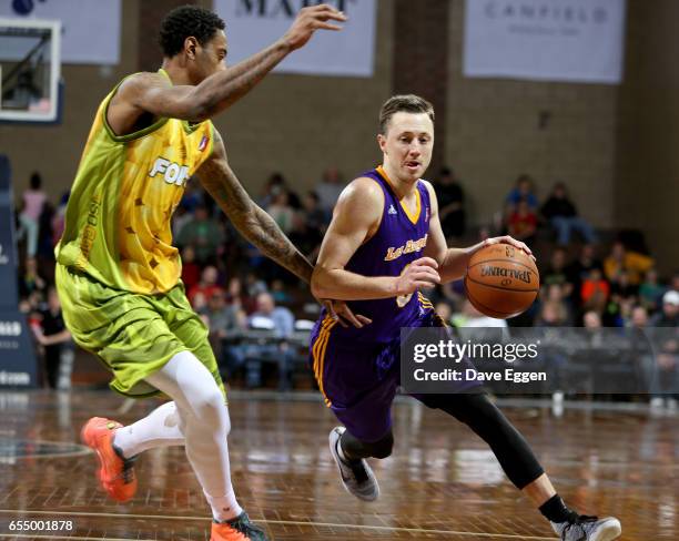 Josh Magette from the Los Angeles D-Fenders drives to the basket against Greg Whittington from the Sioux Falls Skyforce at the Sanford Pentagon March...