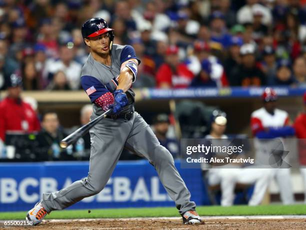 Giancarlo Stanton of Team USA singles in the top of the third inning of Game 6 of Pool F of the 2017 World Baseball Classic against Team Dominican...