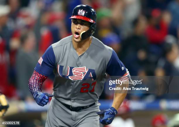 Giancarlo Stanton of Team USA celebrates after hitting a two-run home run in the top of the fourth inning of Game 6 of Pool F of the 2017 World...