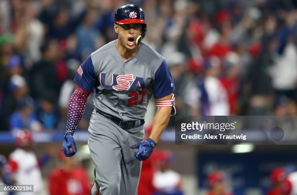 Giancarlo Stanton of Team USA celebrates after hitting a two-run home run in the top of the fourth inning of Game 6 of Pool F of the 2017 World...