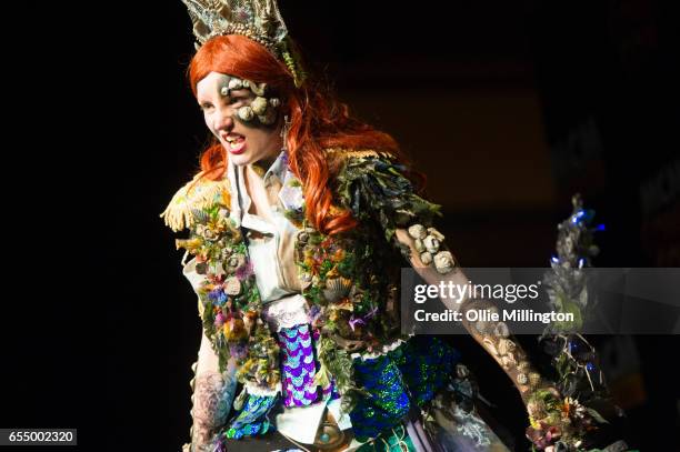 Cosplayer performs as Davy Jones Ariel at the end of Day 1 as Queen Triton during the MCM Birmingham Comic Con at NEC Arena on March 18, 2017 in...