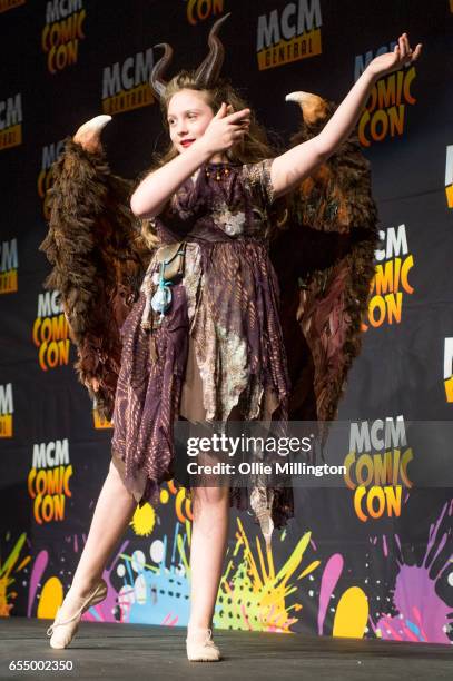 Cosplayer performs at the end of Day 1 as Maleficent during the MCM Birmingham Comic Con at NEC Arena on March 18, 2017 in Birmingham, England.