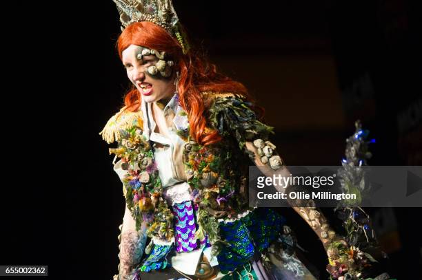 Cosplayer performs as Davy Jones Ariel at the end of Day 1 as Queen Triton during the MCM Birmingham Comic Con at NEC Arena on March 18, 2017 in...