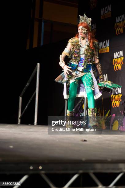 Cosplayer performs as Davy Jones Ariel at the end of Day 1 as Queen Triton during the MCM Birmingham Comic Con at NEC Arena on March 18, 2017 in...