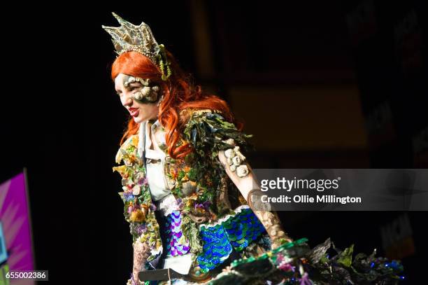Cosplayer performs as Davy Jones Ariel at the end of Day 1 as Queen Triton during the MCM Birmingham Comic Con at NEC Arena on March 18, 2017 in...