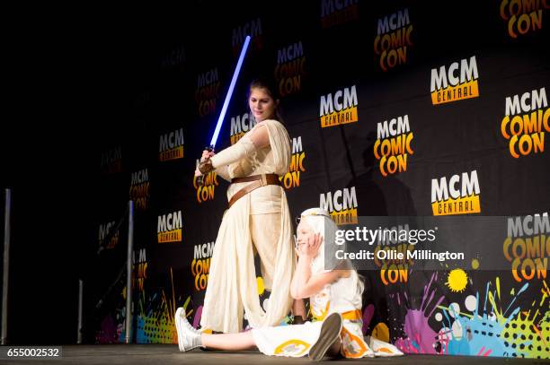 Sister coslay team perform at the end of day 1 as Rey and BB-8 during the MCM Birmingham Comic Con at NEC Arena on March 18, 2017 in Birmingham,...
