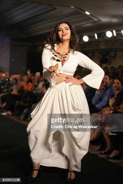 Minakshi Dixit walks the runway at the Mona Shroff show during India Intimate Fashion Week 2017 at Hotel Leela on March 18, 2017 in Mumbai, India.