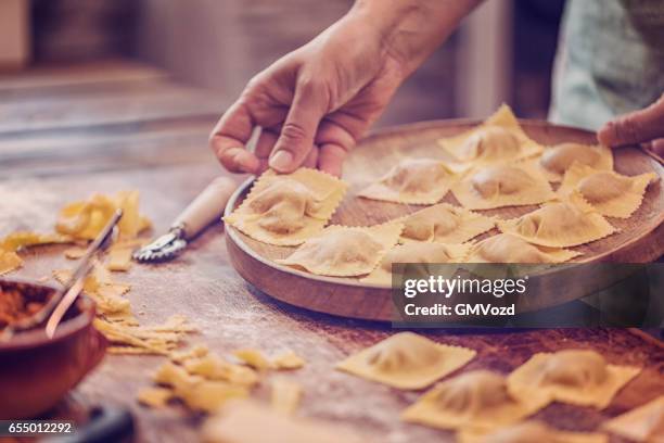 preparing homemade ravioli pasta - italien food stock pictures, royalty-free photos & images